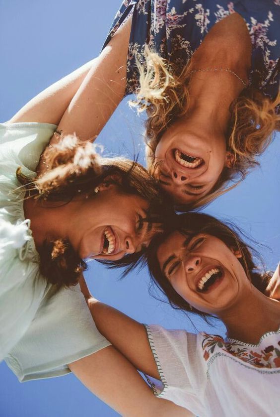 Three Girls smiling and having fun. Stock Photo by ©kanareva 102050584